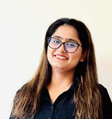 Amandeep Kaur, Physiotherapy Assistant (PTA), smiling for a headshot.